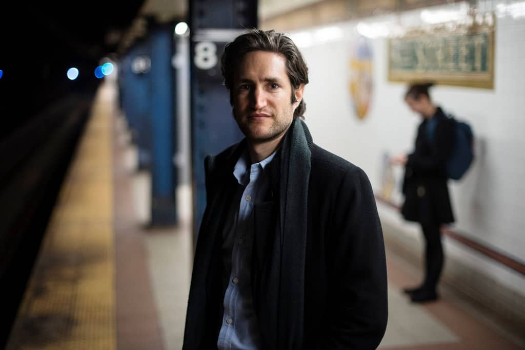 Adam Alter on a New York subway platform